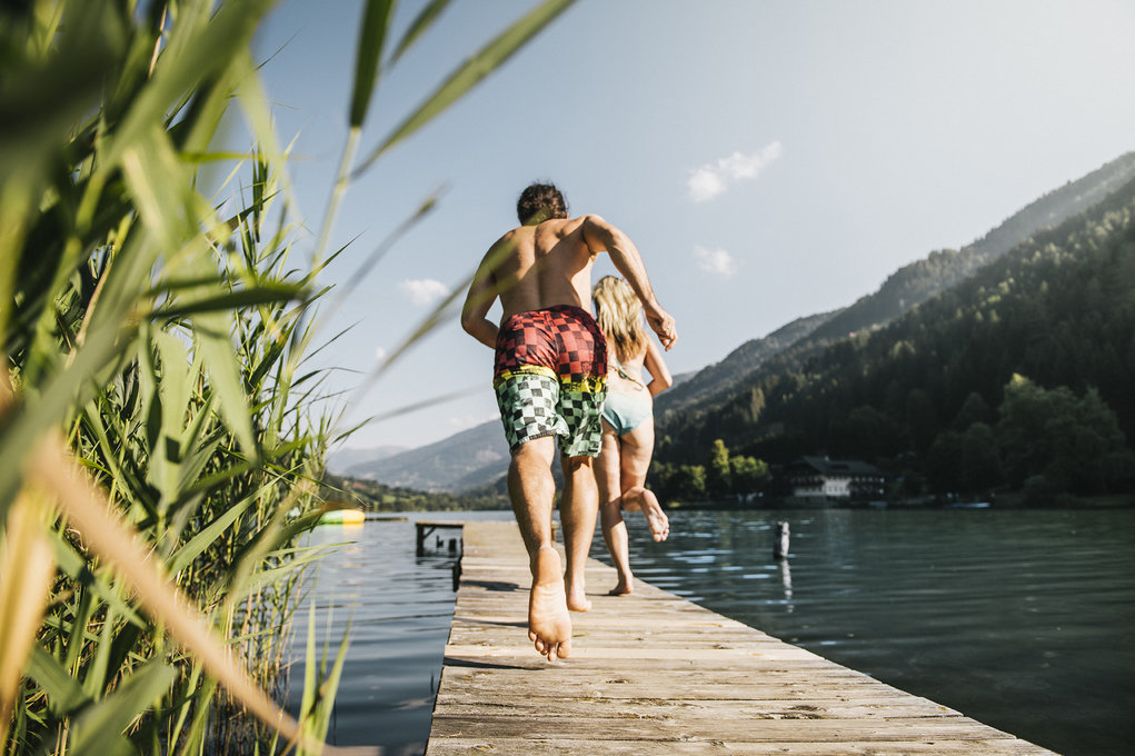 People running along a dock