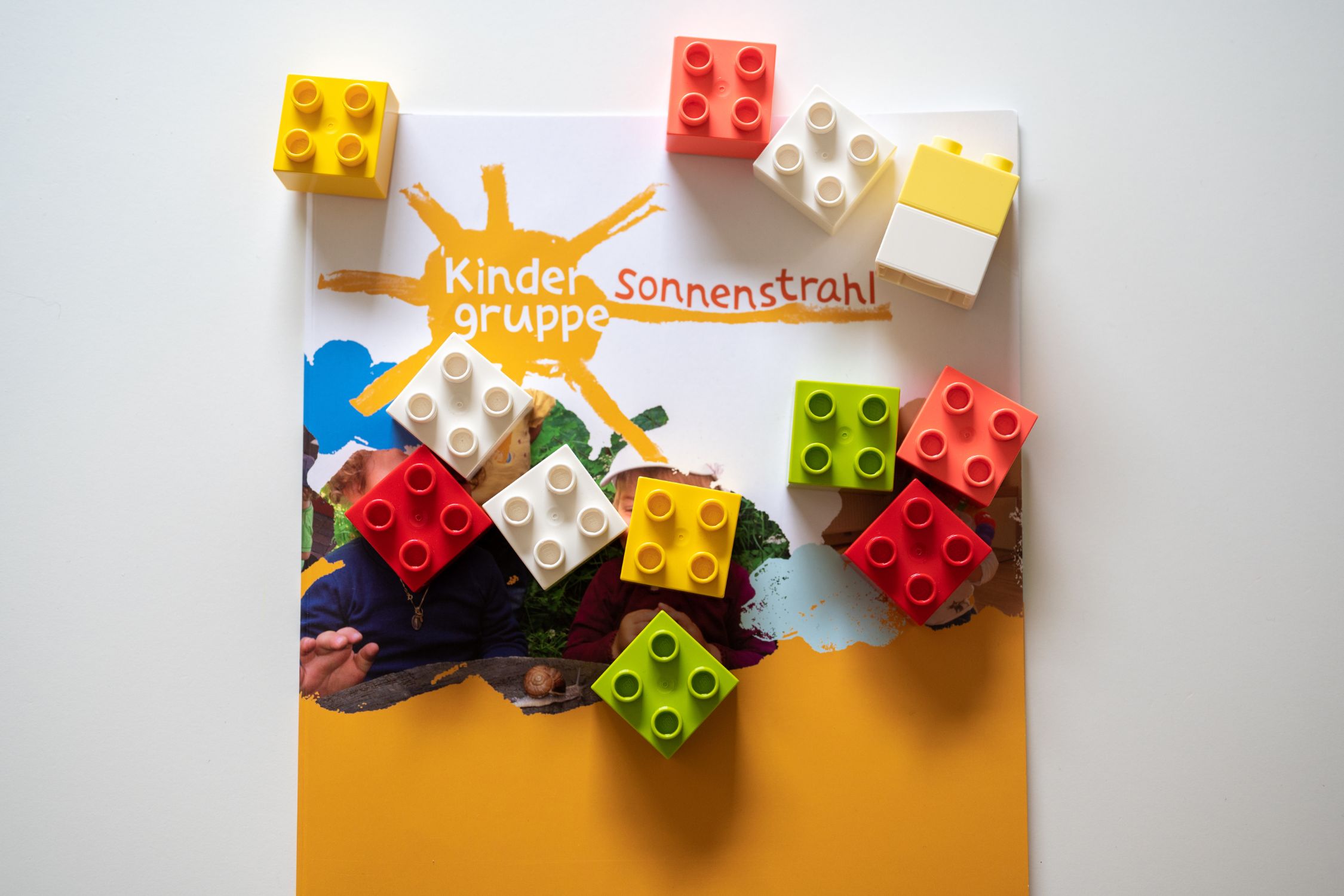 Children's group flyer with toy blocks